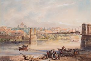 View of a bridge in a city along a river