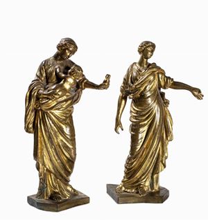 Due figure allegoriche femminili in bronzo