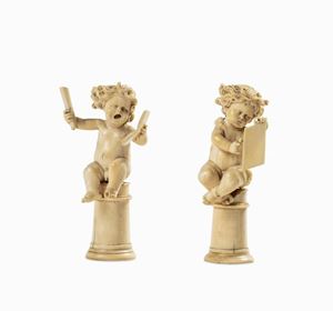 Two musician angels in ivory