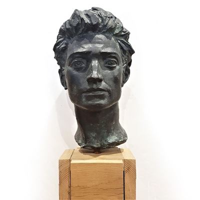 Volto virile - Particolare del Monumento ai Martiri Libanesi, bronzo patina bruna