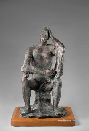 Uomo seduto pensatore