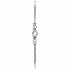 A 18K white gold lady's wristwatch, circa 1940, Hausmann & Co.