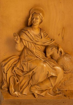 Lemon wood plaque depicting Saint Agnes, 17th century