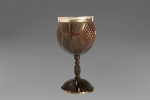 Walnut carved and chalice mounted, with silver finishes, England early 20th century