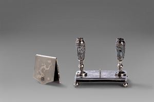 Lot consisting of a silver pen holder signed Wang Hing and a silver match holder, 20th century China