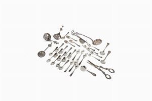 lot consisting of 36 silver objects: 30 teaspoons of different shapes, three ladles, a strainer, a candle snuffer and a grape cutter