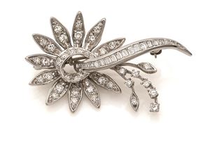 SPILLA IN ORO E DIAMANTI 
Spilla con mot