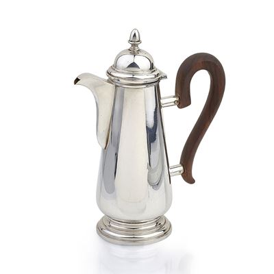 Caffettiera in argento, Milano, 1950-1967, a base circolare con manico in ebano