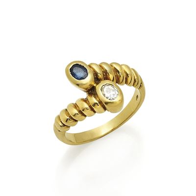 Anello in oro giallo 18K con zaffiro e diamante taglio ovale