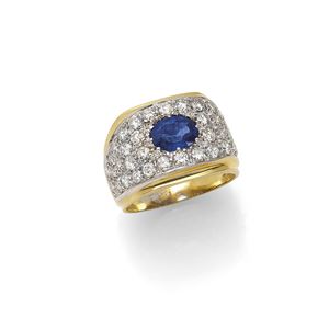 WHITE AND YELLOW GOLD 18K RING WITH BRILLIANT CUT DIAMONDS AND OVAL CUT SAPPHIRE 