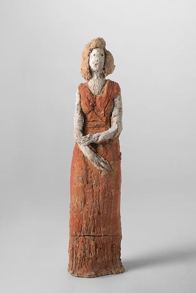 Piccola figura in terracotta dipinta