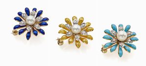 LOTTO DI TRE SPILLE A MARGHERITA
In oro 