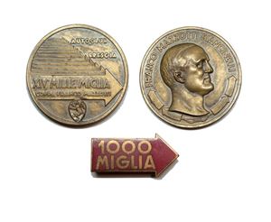 Lotto costituito da medaglia e spilla de