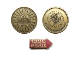 Lotto costituito da medaglia e spilla de