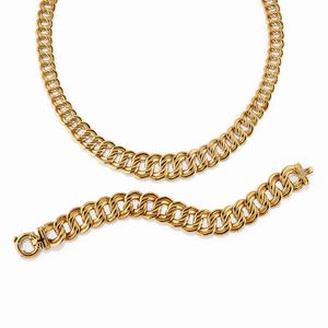 A 18K yellow gold demi parure