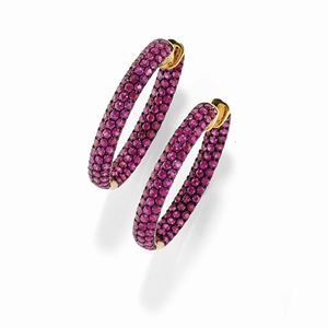 A 18K yellow gold, 18K burnished gold and ruby earclips