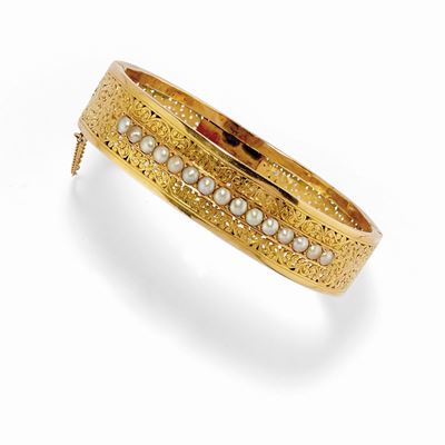 Bracciale rigido in oro giallo 18K con perle, inizio XX secolo