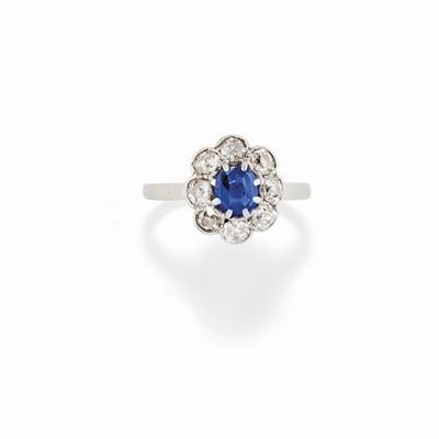 Anello in oro bianco 18K con zaffiro e diamanti