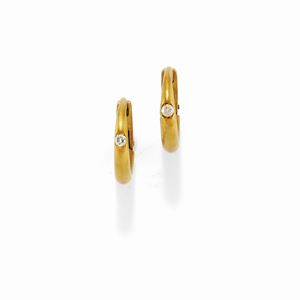 A 18K yellow gold and diamond earclips, Pomellato
