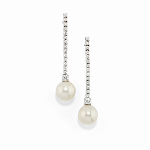 A 18K white gold, cultured pearl and diamond pendant earrings