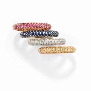 Four 18K two-color gold, sapphire, ruby and diamond rings