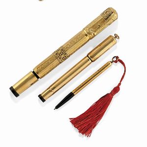 Lot of 18K yellow gold and gold plated pens and one pencil