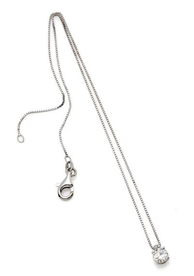 Spilla a fiocco in platino e oro bianco 18K con diamanti e collana punto luce in oro con diamante