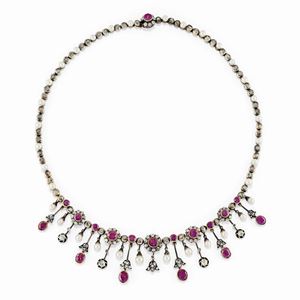 A silver, 18K yellow gold, pearl, ruby and diamond necklace, early 20th Century