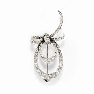 A platinum and diamond brooch