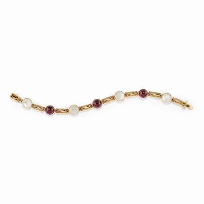Bracciale in oro giallo 18K con pietre colorate e motivi a griglia
