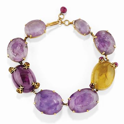 Collana con ametiste, ambra, rubini e pietre dure in argento dorato
