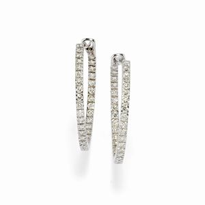 A 18K white gold and diamond earrings