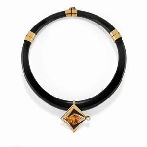 A 18K yellow gold, onyx, diamond and quartz necklace