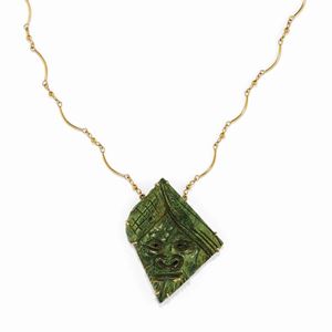 A 18K yellow gold and gemstone necklace with pendant