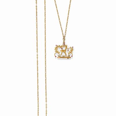 Collana e spilla in oro giallo 18K con pietre rosse