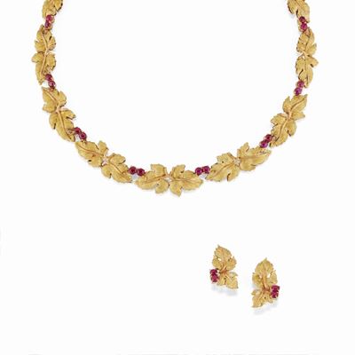 Demi-parure in oro giallo 18K con rubini taglio cabochon