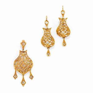 A 18K yellow gold and diamond demi parure