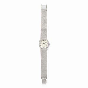A 18K white gold lady's wristwatch, Universal