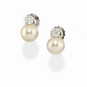 A 18K white gold, cultured pearl and diamond earclips