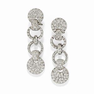 A 18K white gold and diamond pendant earrings