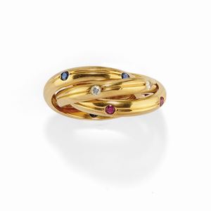 A 18K yellow gold, ruby, sapphire and diamond ring, Cartier