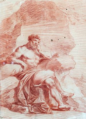 Figura virile seduta in un paesaggio roccioso