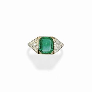 A 18K white gold, emerald and diamond ring, first half of 20th Century