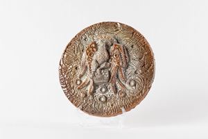 Glazed ceramic tile with eagle with spread wings