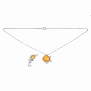 A 18K white gold, diamond and mother of pearl necklace and pendant