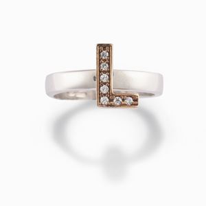 A 18K white and red gold ring