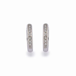 A 18K white gold and diamond earrings