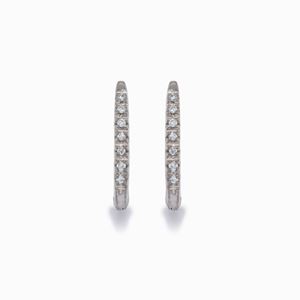 A 18K white gold and diamond earrings