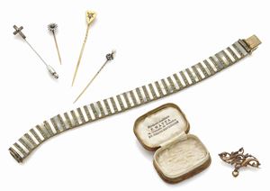 LOTTO D’EPOCA IN METALLI E PIETRE DIVERSE 