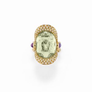 A 18K yellow gold with diamond and green amethyst ring